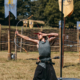Image of Blumineck standing on the ground, preparing to fire an arrow