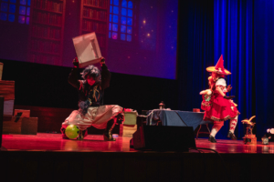 Karrichaos on stage performing a cosplay skit