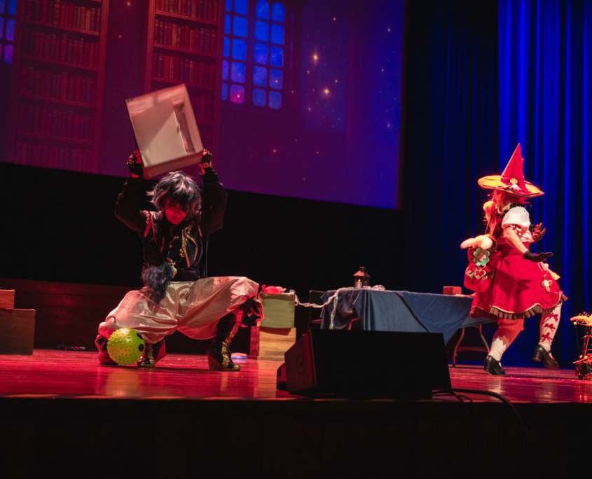 Karrichaos on stage performing a cosplay skit